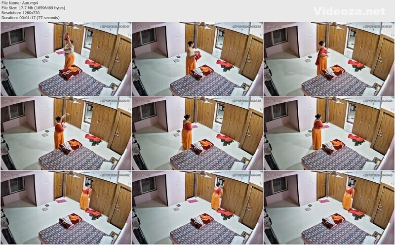 Desi Chubby Aunty Wearing Clothes Captured In CcTv